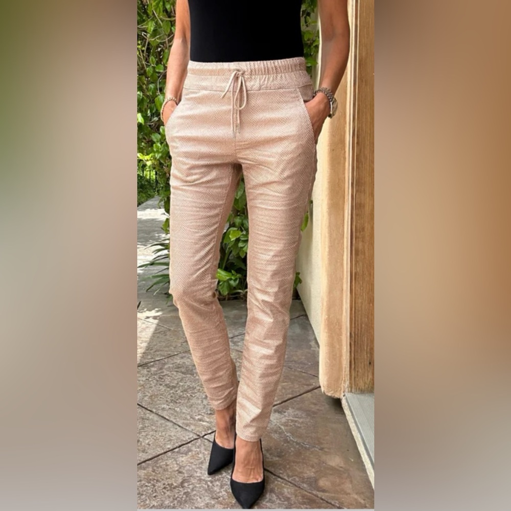Bevy Flog New with tags Shelly size 27. Bronze snake